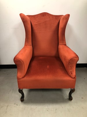 Lot 43 - A late 19th century wingback armchair