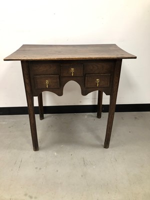 Lot 49 - A small 18th century and later oak lowboy