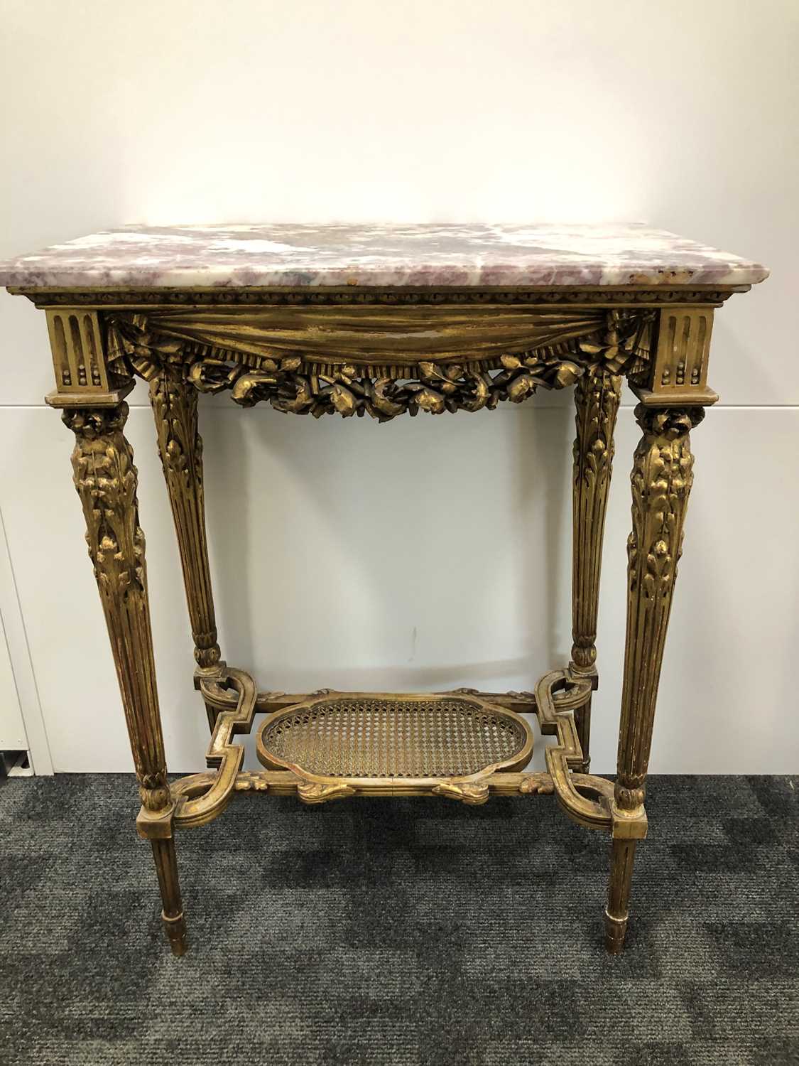 Lot 54 - An early 20th century continental gilt wood and marble topped occasional table