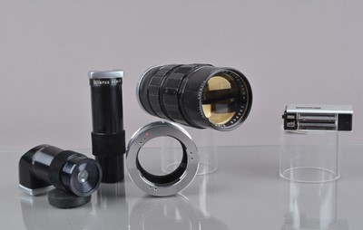 Lot 424 - An Olympus Zuiko 50-90mm f/3.5 Lens and Pen Accessories