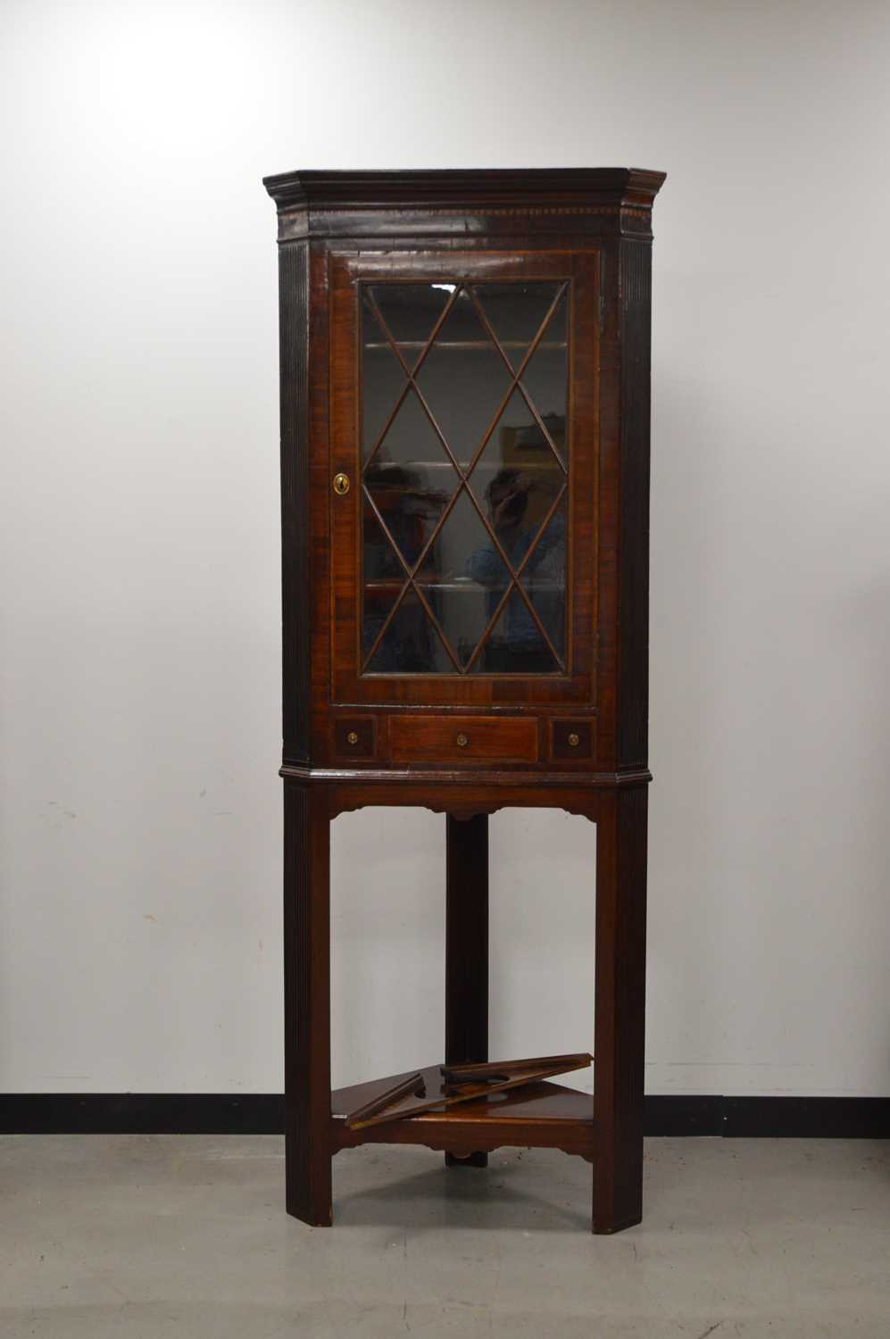 Lot 67 - A 19th century and later mahogany corner cabinet and stand