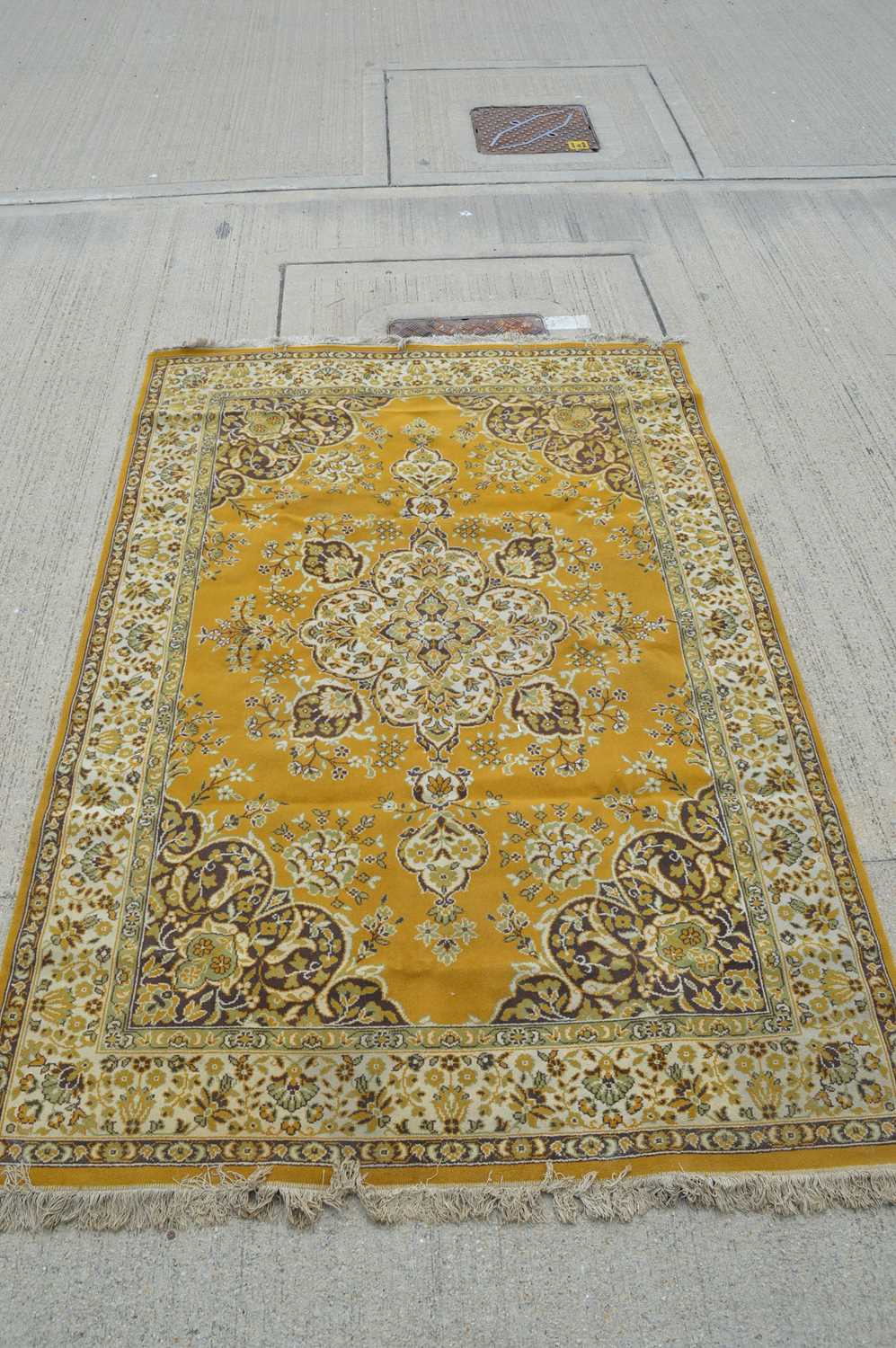 Lot 74 - A 20th century wool on cotton rug