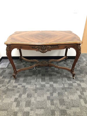 Lot 101 - A 19th century Continental crossbanded mahogany table