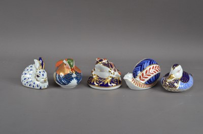 Lot 126 - Five Royal Crown Derby bone china paperweights