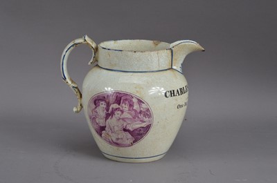 Lot 170 - A 19th century tin-glazed earthenware named jug