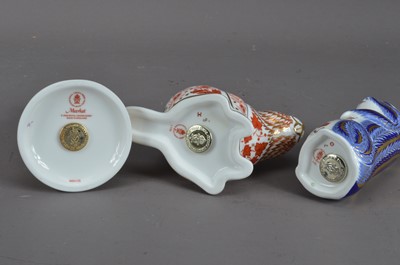 Lot 181 - Three Royal Crown Derby bone china paperweights