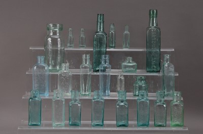 Lot 184 - A collection of Victorian and later green and blue glass bottles