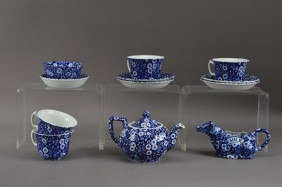 Lot 197 - A Staffordshire Calico Blue and white tea set for four