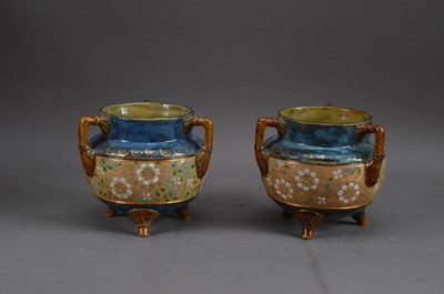 Lot 243 - Two Royal Doulton salt-glaze stoneware tyg's