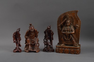 Lot 272 - Four carved wooden Far Eastern sculptures