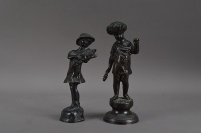 Lot 324 - Two cast Bronze statues