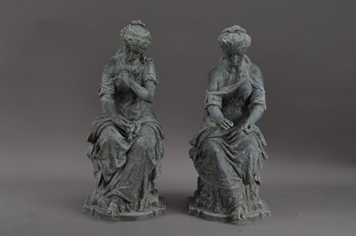 Lot 325 - A pair of spelter sculptures of seated women