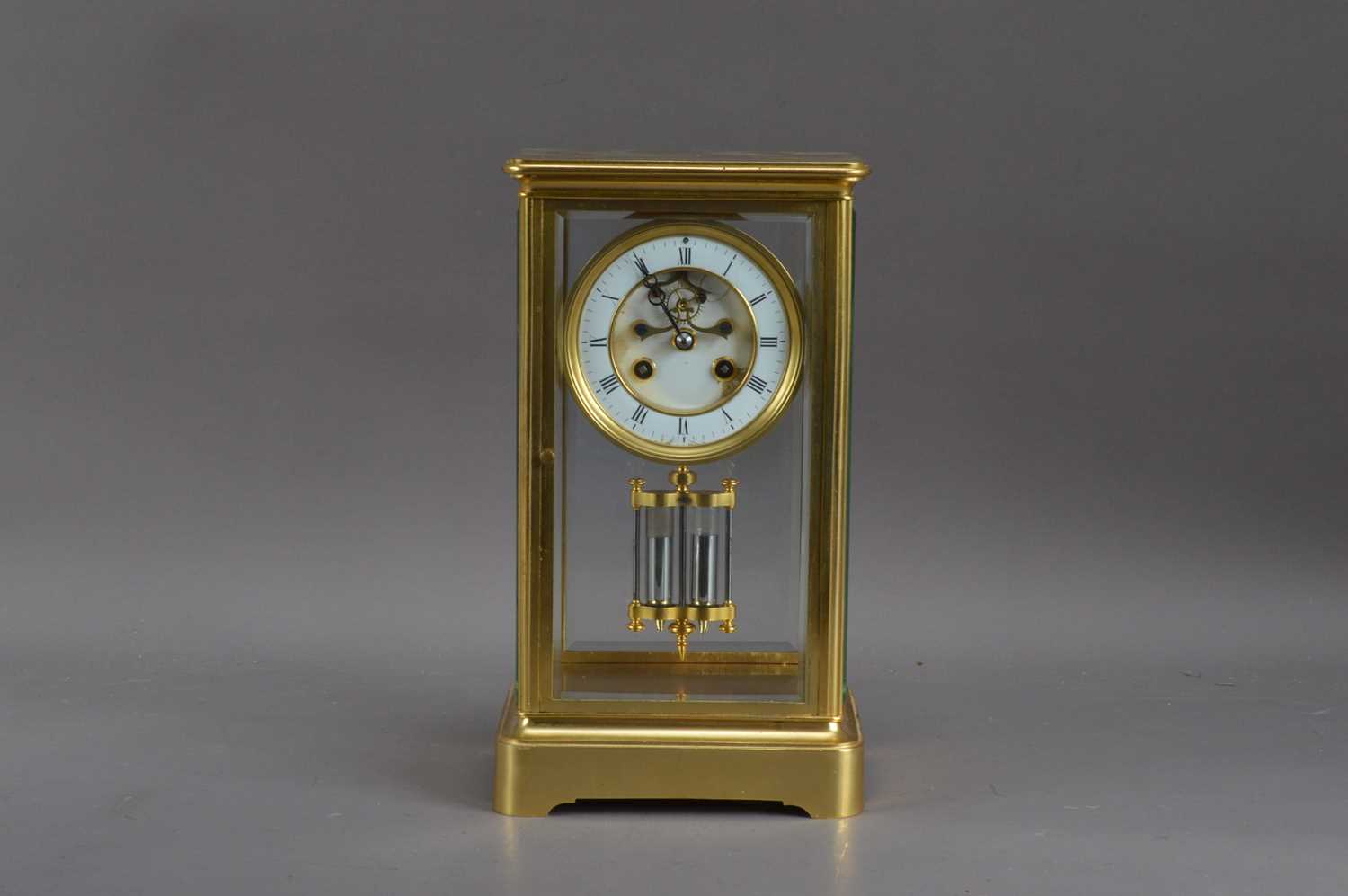 Lot 331 - An early 20th century French brass four glass striking mantle clock