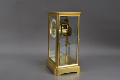 Lot 331 - An early 20th century French brass four glass striking mantle clock