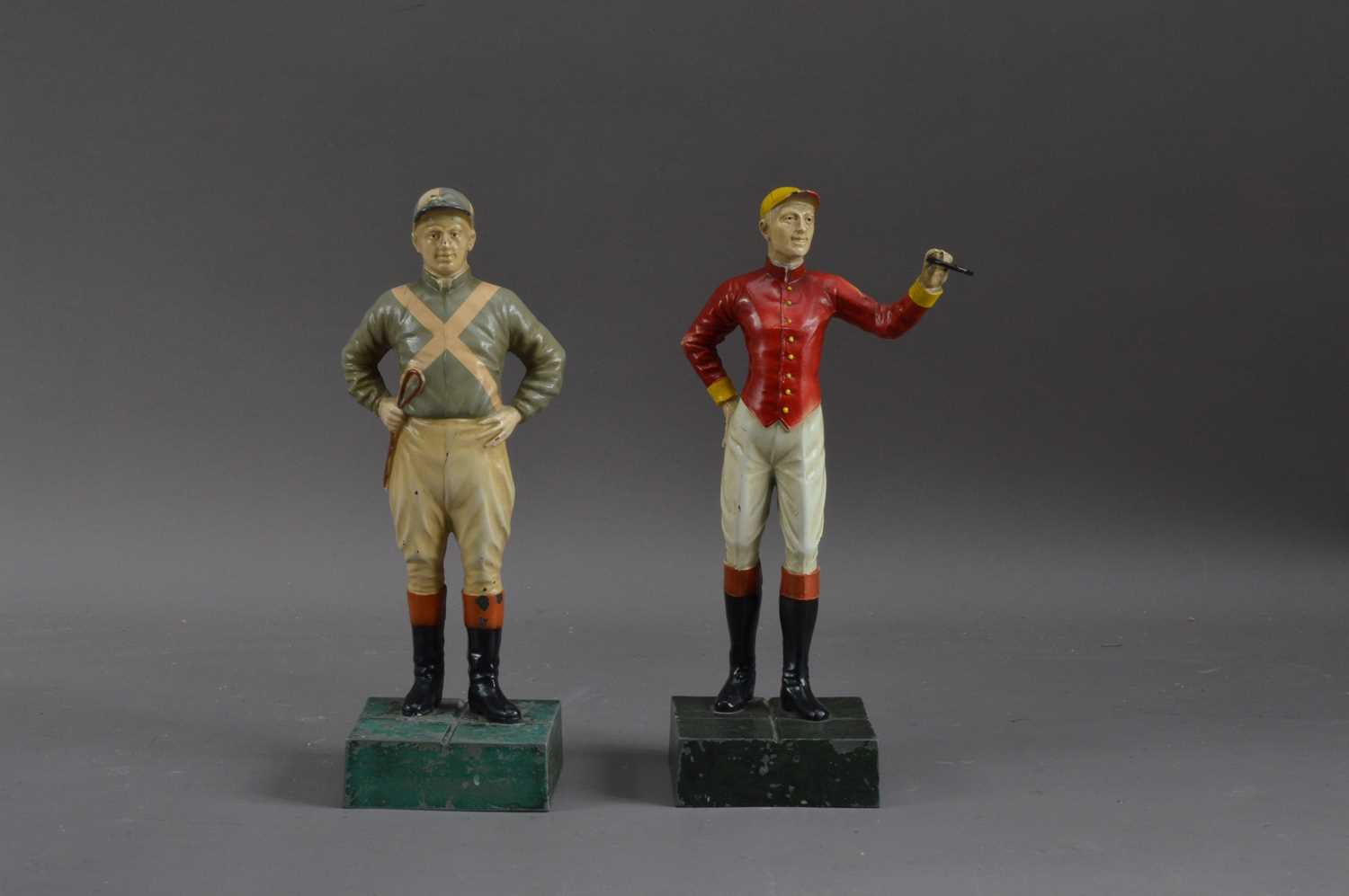 Lot 355 - Two cold painted cast metal jockey sculptures