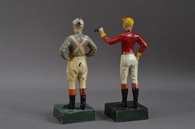 Lot 355 - Two cold painted cast metal jockey sculptures