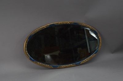 Lot 365 - An oval art deco blue and gilt framed wall mirror