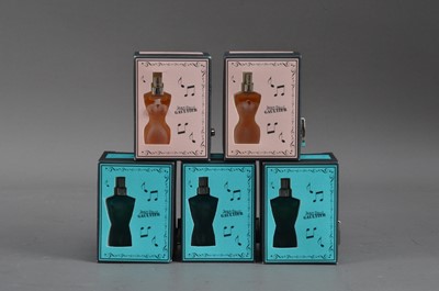 Lot 383 - A collection of five novelty Jean Paul Gaultier perfume miniatures