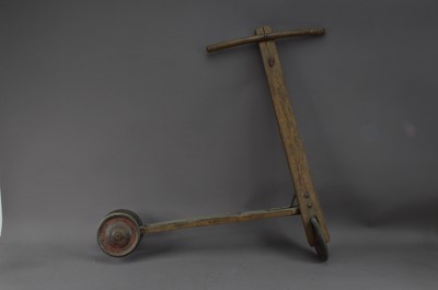 Lot 394 - A 20th century children's scooter