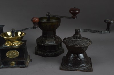 Lot 402 - A collection of 19th century and later cast metal coffee grinders