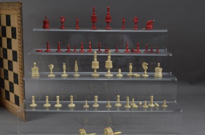 Lot 429 - A damaged set of bone chess pieces