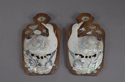 Lot 437 - A pair of early 20th century hard wood and mother of pearl wall pockets