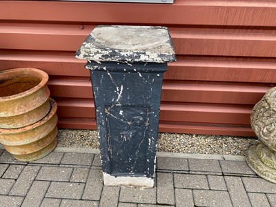 Lot 598 - A black painted concrete column stand