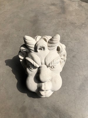 Lot 600 - A modern re-constituted stone bust of a gargoyle