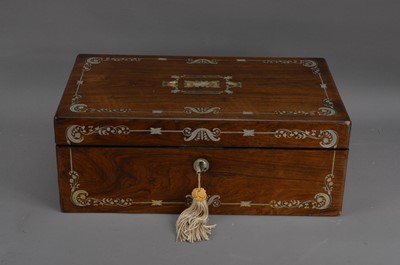Lot 304 - A late 19th century rosewood veneered and mother of pearl inlaid writing slope