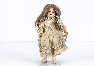 Lot 104 - A small Armand Marseille 1894 child doll