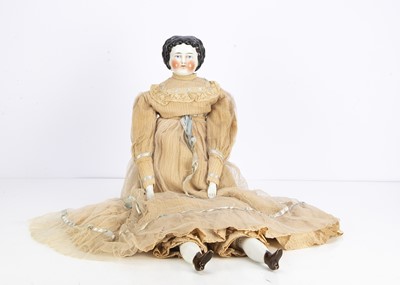 Lot 283 - A 19th century German china shoulder head doll