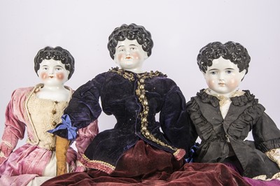 Lot 414 - Three late 19th century German china shoulder head dolls