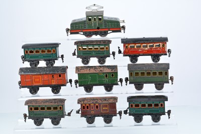 Lot 258 - A Marklin 0 Gauge RV890 clockwork Steeple-cab Locomotive and Continental Market Passenger Stock (10)