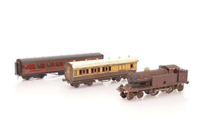 Lot 277 - a Bassett-Lowke 0 Gauge clockwork LMS 4-4-2T Locomotive with Exley and B-L Coaches (3)