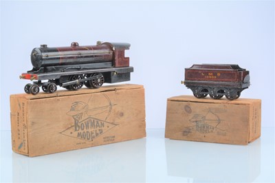 Lot 373 - A Bowman 0 Gauge live steam Model 234 '4-4-0' Locomotive and Tender in original boxes (2)