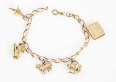Lot 6 - A 9ct gold charm bracelet