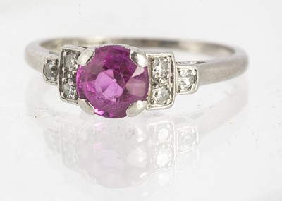 Lot 7 - An Art Deco platinum diamond and synthetic ruby dress ring