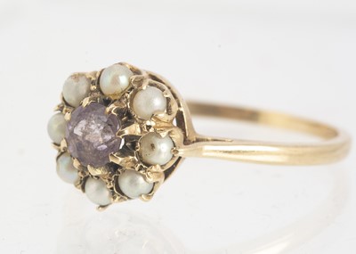 Lot 47 - A 9ct gold amethyst and seed pearl dress ring