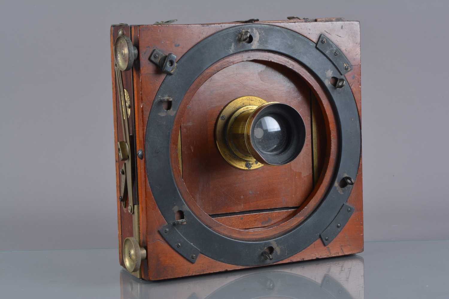 Lot 100 - An early 20th Century mahogany and brass Thornton-Pickard Special Ruby Half-Plate Field Camera