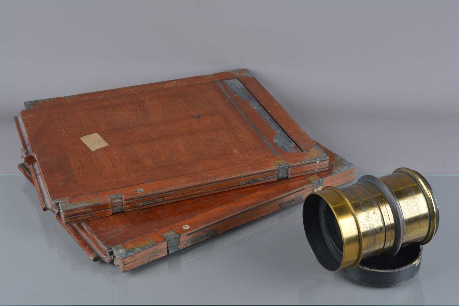 Lot 104 - A late 19th Century J Lancaster & Son lacquered brass 'Very Rapid Cabinet No 382-B-Patent' 11in Studio Camera Lens
