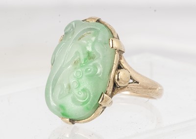 Lot 124 - A certificated Chinese jadeite jade carved panel ring