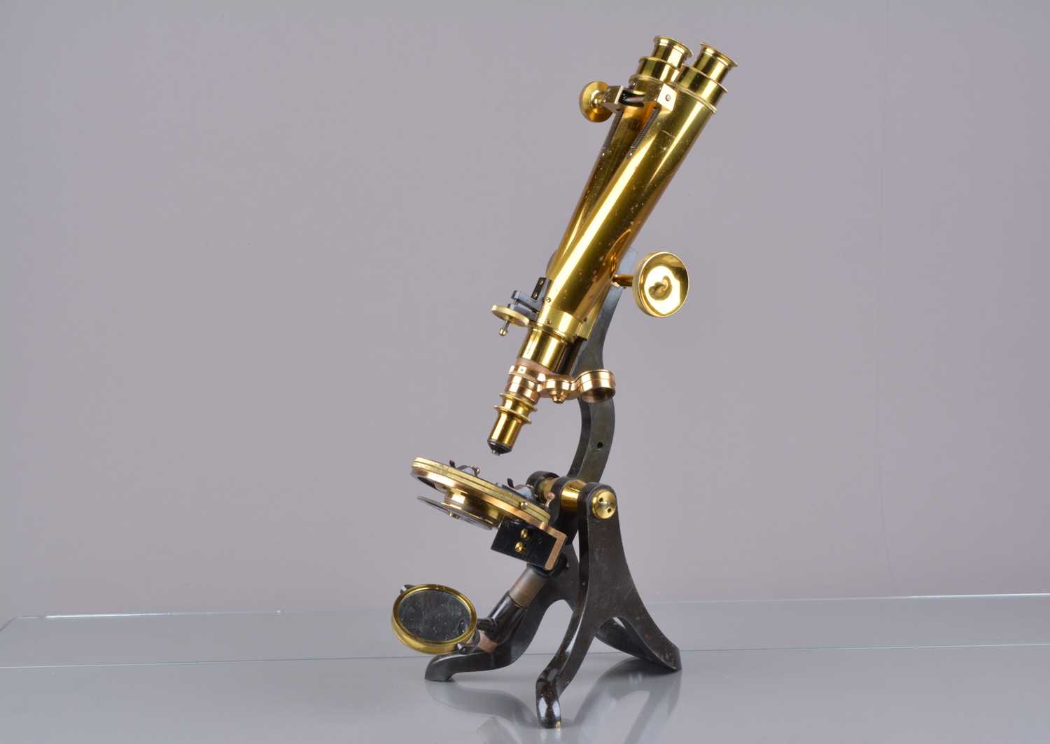 Lot 8 - A late 19th Century lacquered brass and black-painted Wenham Compound Binocular Microscope