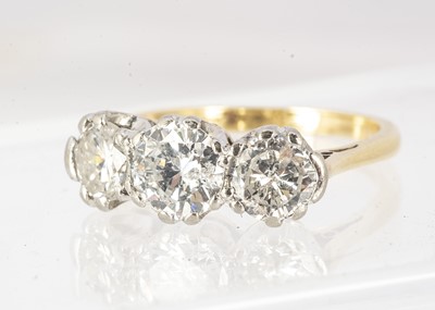 Lot 129 - A three stone diamond ring