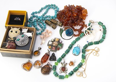 Lot 140 - A collection of hardstone and amber and costume jewels