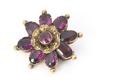 Lot 177 - A 19th century foil backed garnet brooch