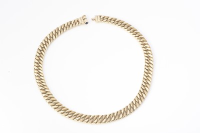 Lot 216 - A 9ct gold curb linked polished and textured necklace