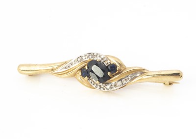 Lot 233 - A 9ct gold sapphire and diamond brooch