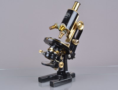 Lot 9 - A mid 20th Century lacquered and black-lacquered brass Carl Zeiss Jug-Handle Compound Monocular Microscope