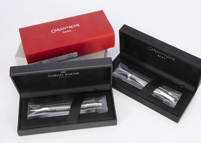 Lot 273 - Two modern unused Caran D'Ache biro pens