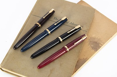 Lot 319 - Four vintage Parker Duofold fountain pens